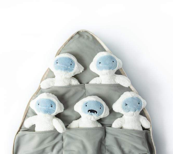 The five feels tucked away in their individual pocket inside the zip-up mountain pillow - View Product