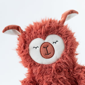 Close up of face of ultra-plush Alpaca stuffed animal