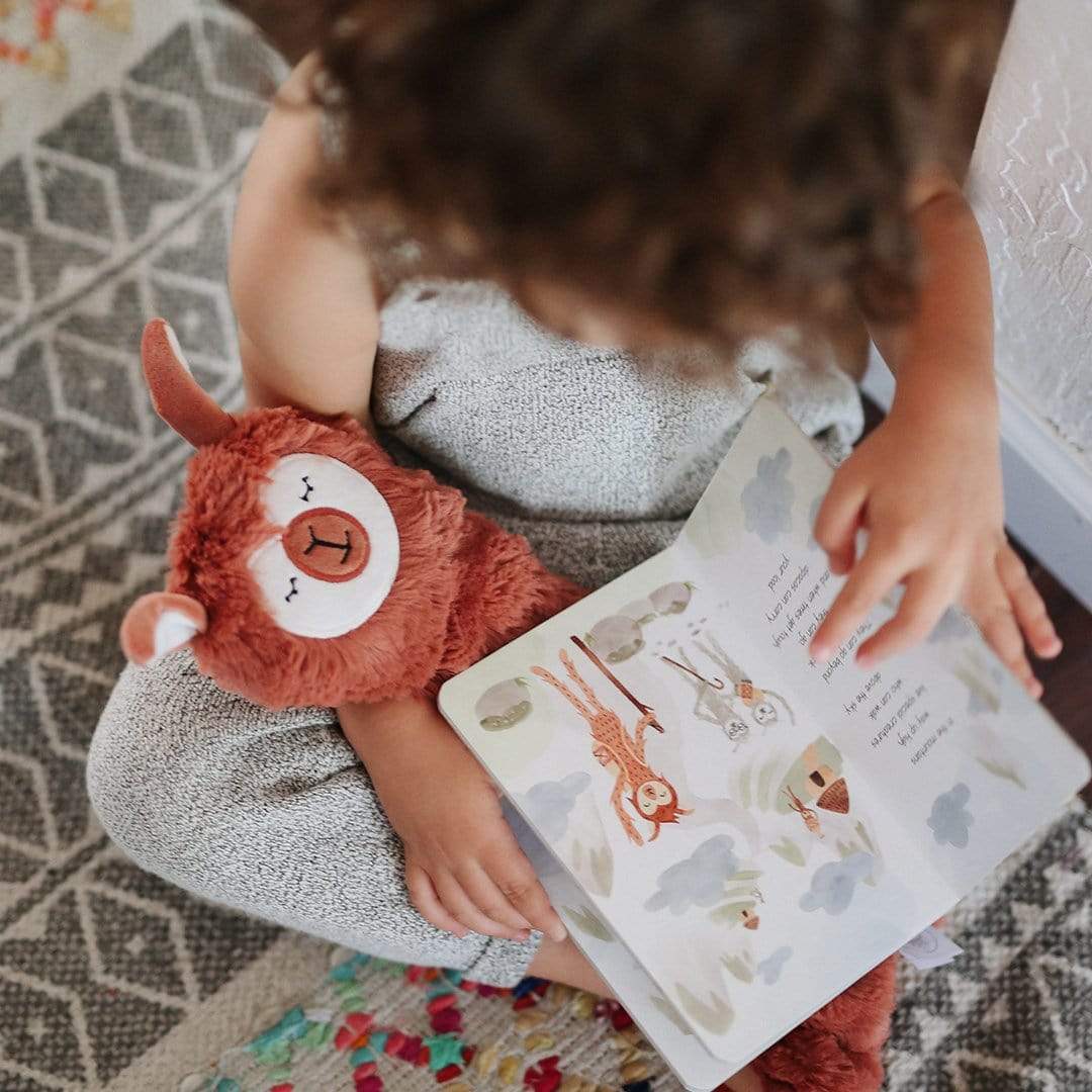 child reading book teaching them how to handle stress